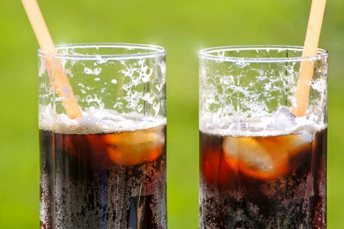 Two Glasses With Beverage and Straws